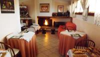 A restaurant or other place to eat at B&B La Casa di Zia Lina