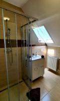 Łazienka w obiekcie Nap-Hold Apartman