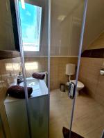 Łazienka w obiekcie Nap-Hold Apartman