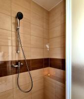 Łazienka w obiekcie Nap-Hold Apartman