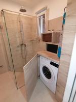 Kuchyňa alebo kuchynka v ubytovaní Apartmani Kiko
