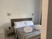 Posteľ alebo postele v izbe v ubytovaní Hotel Arena