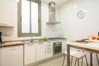 Kuchyň nebo kuchyňský kout v ubytování Habitat Apartments Alibei