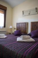 Postel nebo postele na pokoji v ubytování Vivienda Turistica El Caneco