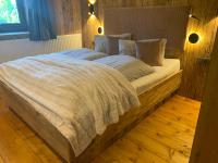 Posteľ alebo postele v izbe v ubytovaní Chalet Apart Hansler