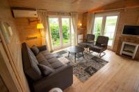 TV a/nebo společenská místnost v ubytování chalet Esra 190