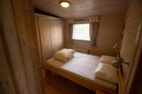 Postel nebo postele na pokoji v ubytování chalet Esra 190