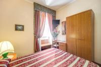 Posteľ alebo postele v izbe v ubytovaní Buonarroti Home