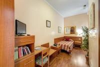 Posteľ alebo postele v izbe v ubytovaní Buonarroti Home