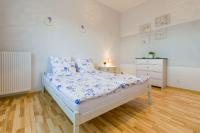 Postel nebo postele na pokoji v ubytování Przytulny Apartamencik