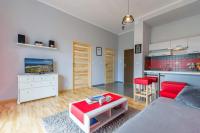 Posezení v ubytování Przytulny Apartamencik