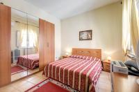 Posteľ alebo postele v izbe v ubytovaní Buonarroti Home