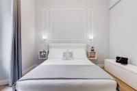 Posteľ alebo postele v izbe v ubytovaní Migliori Collection Apartment