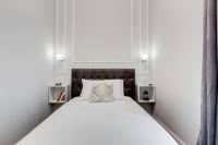 Posteľ alebo postele v izbe v ubytovaní Migliori Collection Apartment