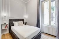 Posteľ alebo postele v izbe v ubytovaní Migliori Collection Apartment