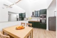 Kuchyňa alebo kuchynka v ubytovaní I Renai - Ponte delle Grazie Modern Apartment