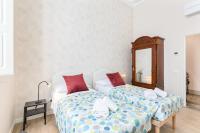 Posteľ alebo postele v izbe v ubytovaní I Renai - Ponte delle Grazie Modern Apartment
