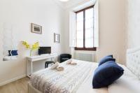 Posteľ alebo postele v izbe v ubytovaní I Renai - Ponte delle Grazie Modern Apartment