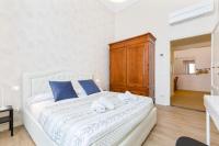 Posteľ alebo postele v izbe v ubytovaní I Renai - Ponte delle Grazie Modern Apartment