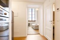Posteľ alebo postele v izbe v ubytovaní I Renai - Ponte delle Grazie Modern Apartment