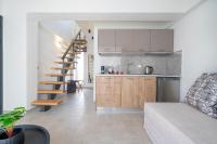 A kitchen or kitchenette at Aelia Seaside Luxury Suites