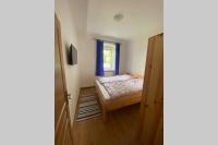 Postel nebo postele na pokoji v ubytování Apartmán u břehu Lipna
