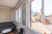 A balcony or terrace at Asinelli, Bologna by Short Holidays