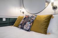 Postel nebo postele na pokoji v ubytování Apartamenty ZŁOTY PIERNIK