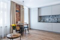 Kuchyň nebo kuchyňský kout v ubytování Apartamenty ZŁOTY PIERNIK