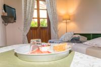 Posteľ alebo postele v izbe v ubytovaní B&B Il Glicine Molare