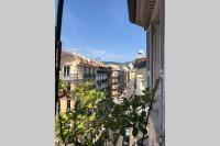 a view of a city street from a window at Appartement 3 pièces ultra centre nice-ville in Nice