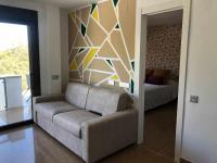Posezení v ubytování Apartamento 2 en chalet con vista abierta al mar