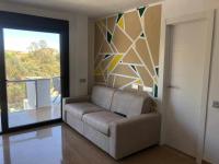 Posezení v ubytování Apartamento 2 en chalet con vista abierta al mar