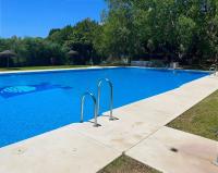 Bazén v ubytování Apartamento 2 en chalet con vista abierta al mar nebo v jeho okolí