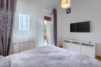 Televízia a/alebo spoločenská miestnosť v ubytovaní Casa Lori