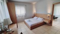 Postel nebo postele na pokoji v ubytování Chloe Apartments