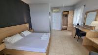 Postel nebo postele na pokoji v ubytování Chloe Apartments