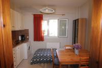 A kitchen or kitchenette at COZY APARTMENT IN THE HEART OF THE TOWN