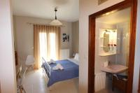 A bed or beds in a room at COZY APARTMENT IN THE HEART OF THE TOWN