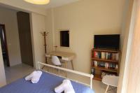 A bed or beds in a room at COZY APARTMENT IN THE HEART OF THE TOWN