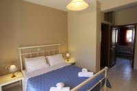 A bed or beds in a room at COZY APARTMENT IN THE HEART OF THE TOWN