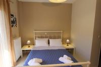 A bed or beds in a room at COZY APARTMENT IN THE HEART OF THE TOWN
