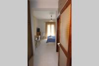 A bed or beds in a room at COZY APARTMENT IN THE HEART OF THE TOWN