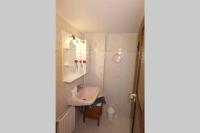 A bathroom at COZY APARTMENT IN THE HEART OF THE TOWN