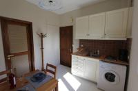 A kitchen or kitchenette at COZY APARTMENT IN THE HEART OF THE TOWN
