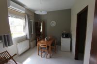 A kitchen or kitchenette at COZY APARTMENT IN THE HEART OF THE TOWN