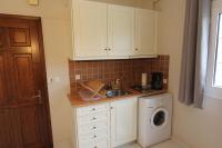 A kitchen or kitchenette at COZY APARTMENT IN THE HEART OF THE TOWN