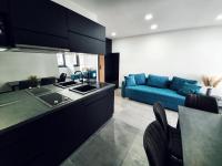 Kuchyňa alebo kuchynka v ubytovaní Positano Apartman