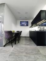 Kuchyňa alebo kuchynka v ubytovaní Positano Apartman