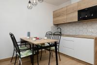 Kuchyňa alebo kuchynka v ubytovaní Apartamenty Zielona 11 by Noclegi Renters